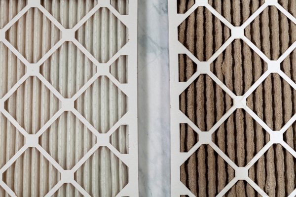 clean and dirty HVAC filters side by side