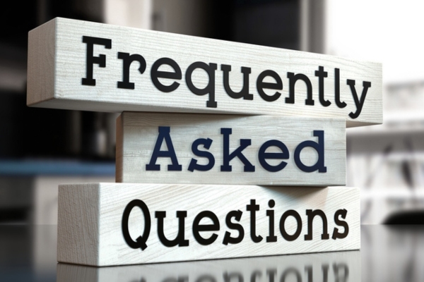 frequently asked questions on wooden blocks depicting air conditioner FAQs