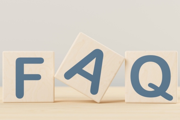 FAQ spelled using wooden blocks depicting questions About Heating Oil Costs