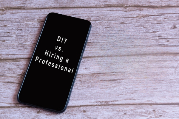 DIY vs hiring a professional displayed on smart phone screen depicting boiler repairs